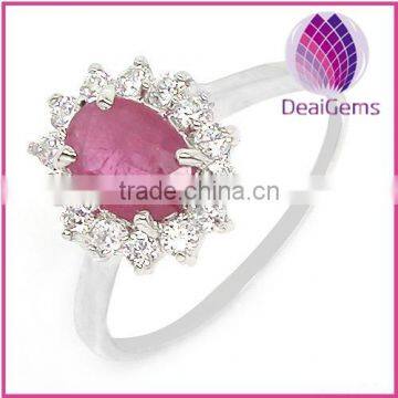 Ring sterling silver and ruby (natural) 5x7mm faceted oval with fourteen-rhinestone