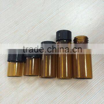 amber color tube glass bottle with black cap