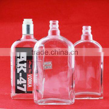 Best selling flat absoluteefd bottles 700ml fan shape brndy bottles guiter shape glass bottle