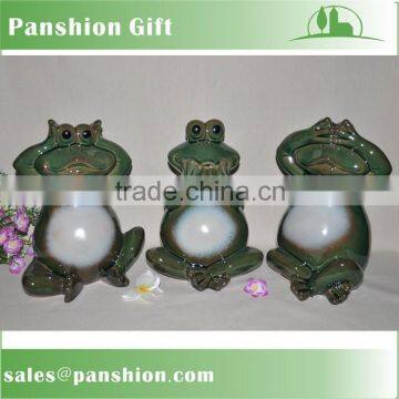 Ceramic garden frog statue