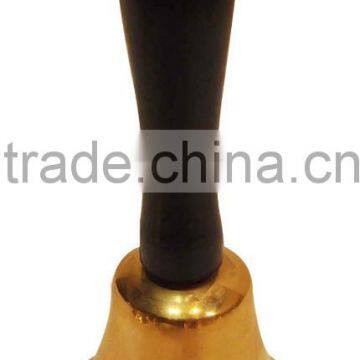 antique brass bell with wooden handle