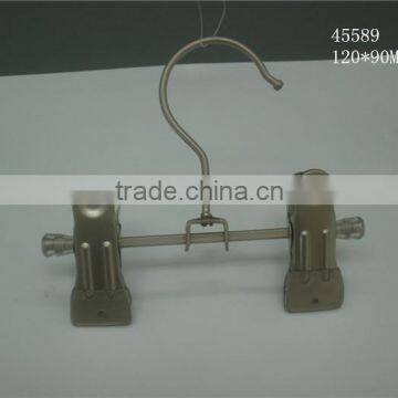 The HEAD metal hanger with transperant immesed clips(black n) and transparent injection ends.