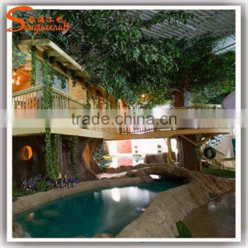 Newest Design China Supplier Large Outdoor Plastic Leaves Wooden Artificial Tree House for Sale photo-2