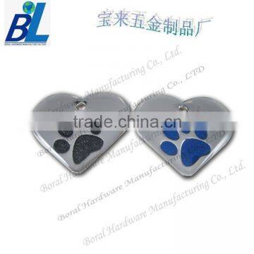 heart shape metal dog tag with footprints