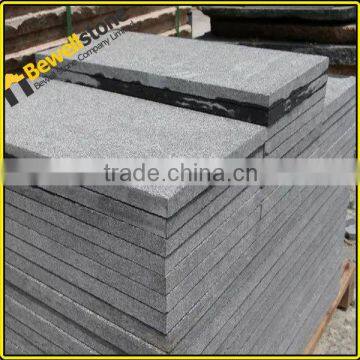 Intalling China black Basalt cobbles for car parking area