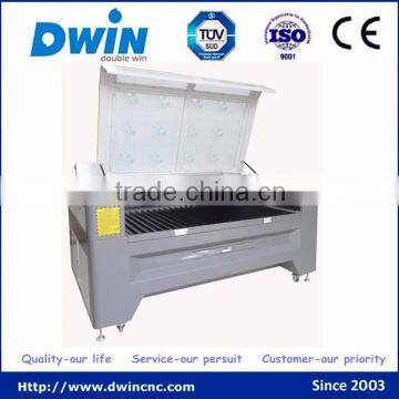 Dwin metal and nonmetal laser cutting machine co2 laser machine with rotary for sale