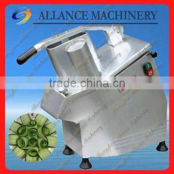 Hand operated fruit and vegetable slicer