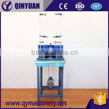 cocoon bobbin winding machine with oil and wax devices