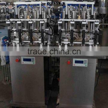China Guangzhou Factory Small Perfume Bottle Four Head Filling Machine/equipment With Negative Pressure for Sale photo-2