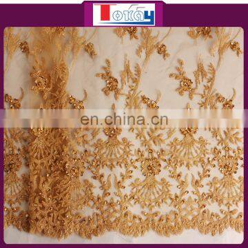 beautiful design of embroidered beaded tulle fabric for wedding and party