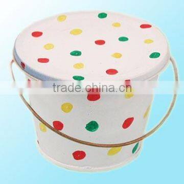 Colorful dots on the tin ice bucket