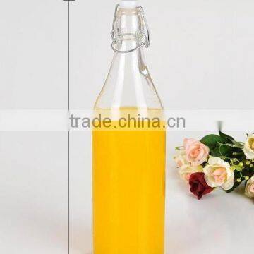 beverage bottle with sealed pull-ring lid