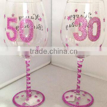 clear decorative blown glass wine bottles with pink powder