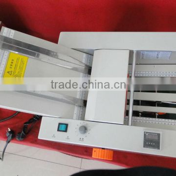 Paper folding machine