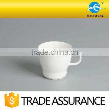 white porcelain tea cup with handle