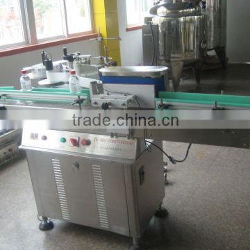 Automatic self-adhesive cylinder bottle labeling machine