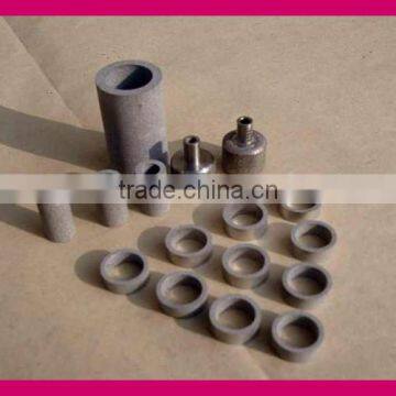 Sintered porous metal filter elements