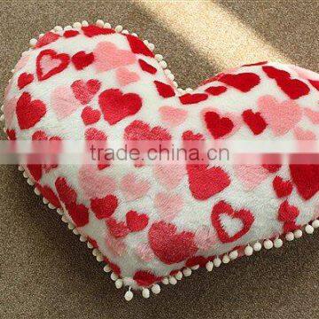 Heart-shaped plush cushion