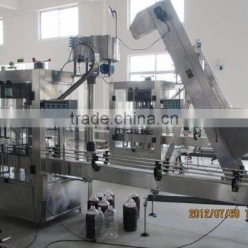 Automatic Rotary Orange Juice Bottle Capping Machine photo-3