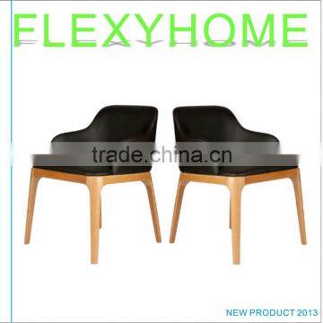 Timeless classic armchair in black PU leather and sold wood armchair