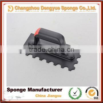 Plastering trowel with toothed plastic handle rubber Tile bricklaying tool