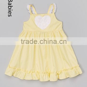 Model kids beautiful dresses yellow heart back neck design babydoll dress