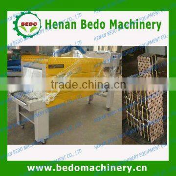 PE film heat shrink wrapping machine for wood briquettes 008613592516014