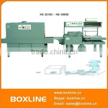 Automatic trayless shrink packaging plastic bottle machine