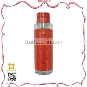 Charming red leather wrapped deodorant spray lotion pump