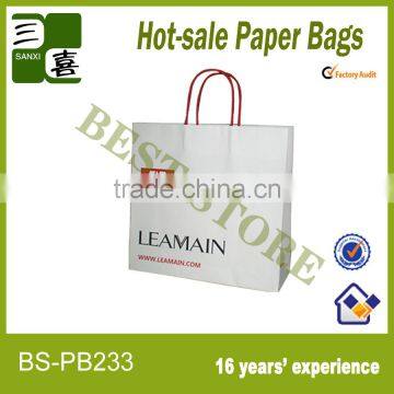 Uniqlo white paper bags with handles