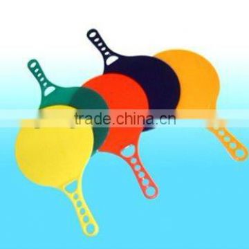 Plastic beach racket with ball