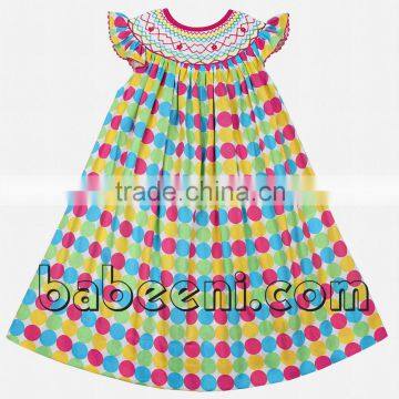 Lovely geometric hand smocked bishop dress