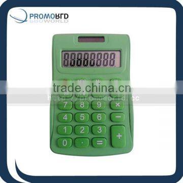 big green desktop calculator.green solar calculator