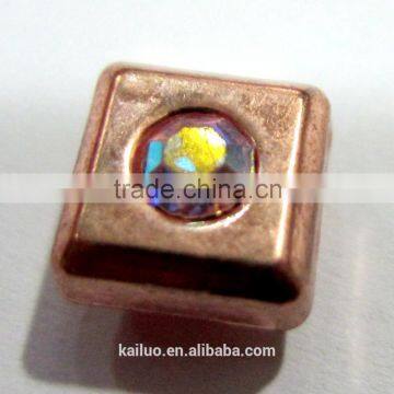 bright copper color rivet with colorful A stone