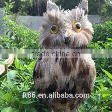 with bright eyes feathered owl decoration feathered owl