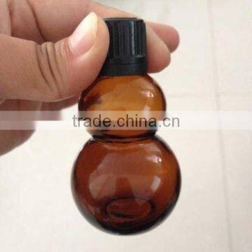 Unique Shaped Amber Boston Round Glass Bottles photo-4