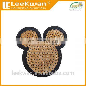 Gold sequin embroidery applique with sew-on backing