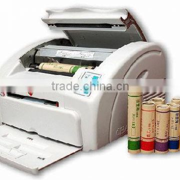 Coin wrapping machine