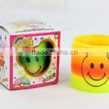 high quality colorful plastic rainbow spring with smile face/magic rainbow circle