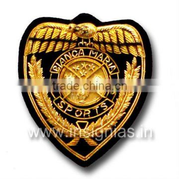 Embroidered bullion wire badges