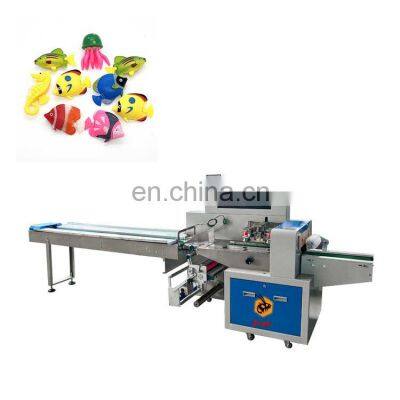 Toy packing machine toy packaging machine horizontal pillow packing machine