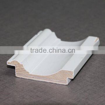 white primed solid wood profile for building