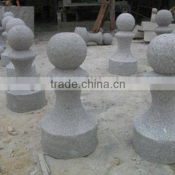 chess pieces curved by granite