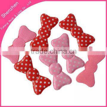 Butterfly shaped fringe hair tie pad