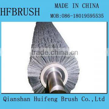 Abrasive brush roller