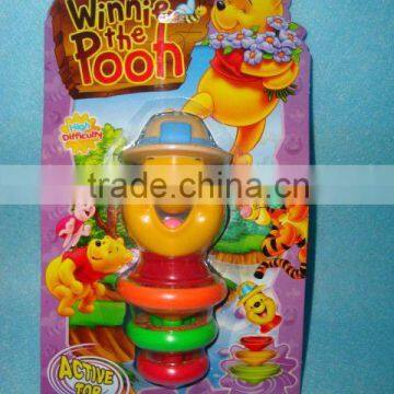 Winnie spinning top with light and music