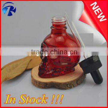 new skull shape red 1oz skull head glass perfume bottle/skull dropper bottle