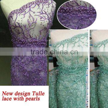 Top quality pearl beads embroidery designs for lace fabric/New type of lace material for wedding dress 2016