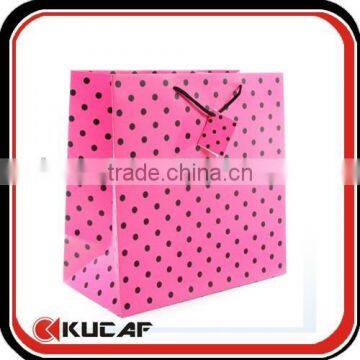 Dots pink coated paper bag for gift