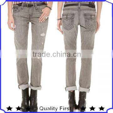 good quality shredded holes and hazy whiskering deconstruct jeans with 3 button fly